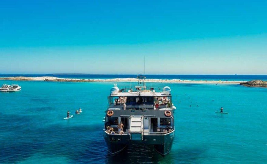 Excursión a Formentera + Atardecer en Es Vedrá con DJ y saxofonista